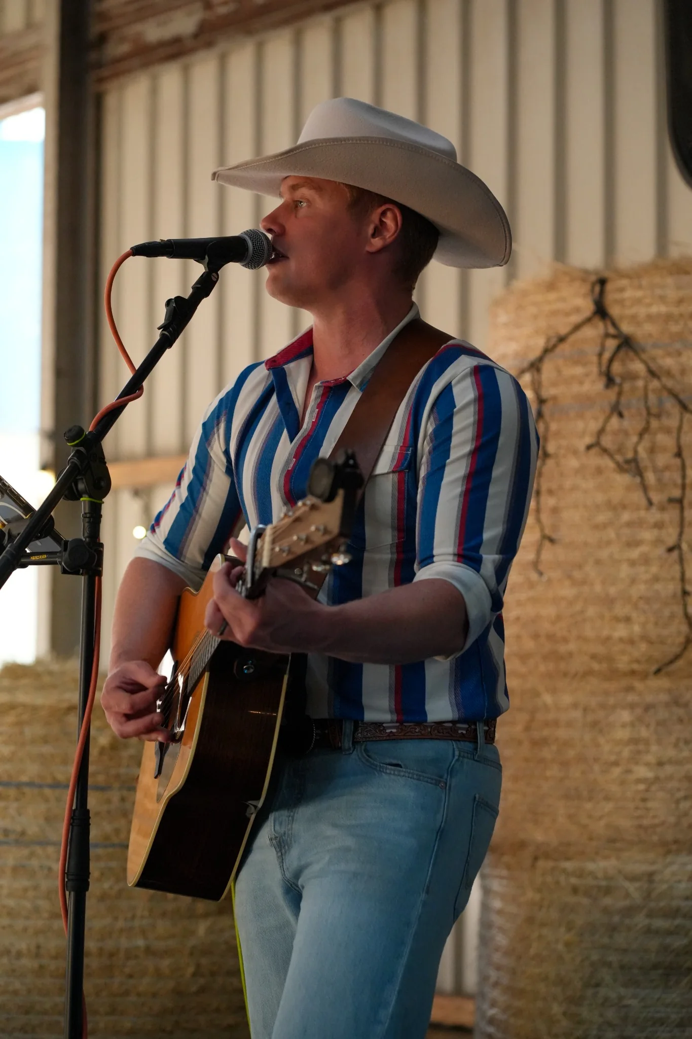 Jake performing in a country style